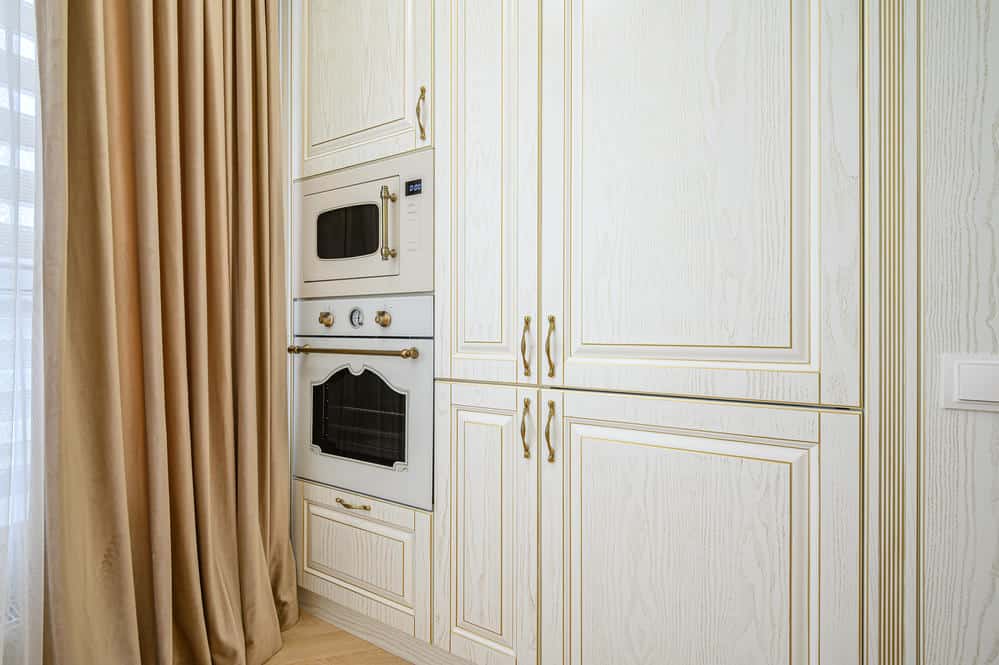 Modern kitchen remodeling with open door cabinets in Carrollton TX by Granite Fabrication Center